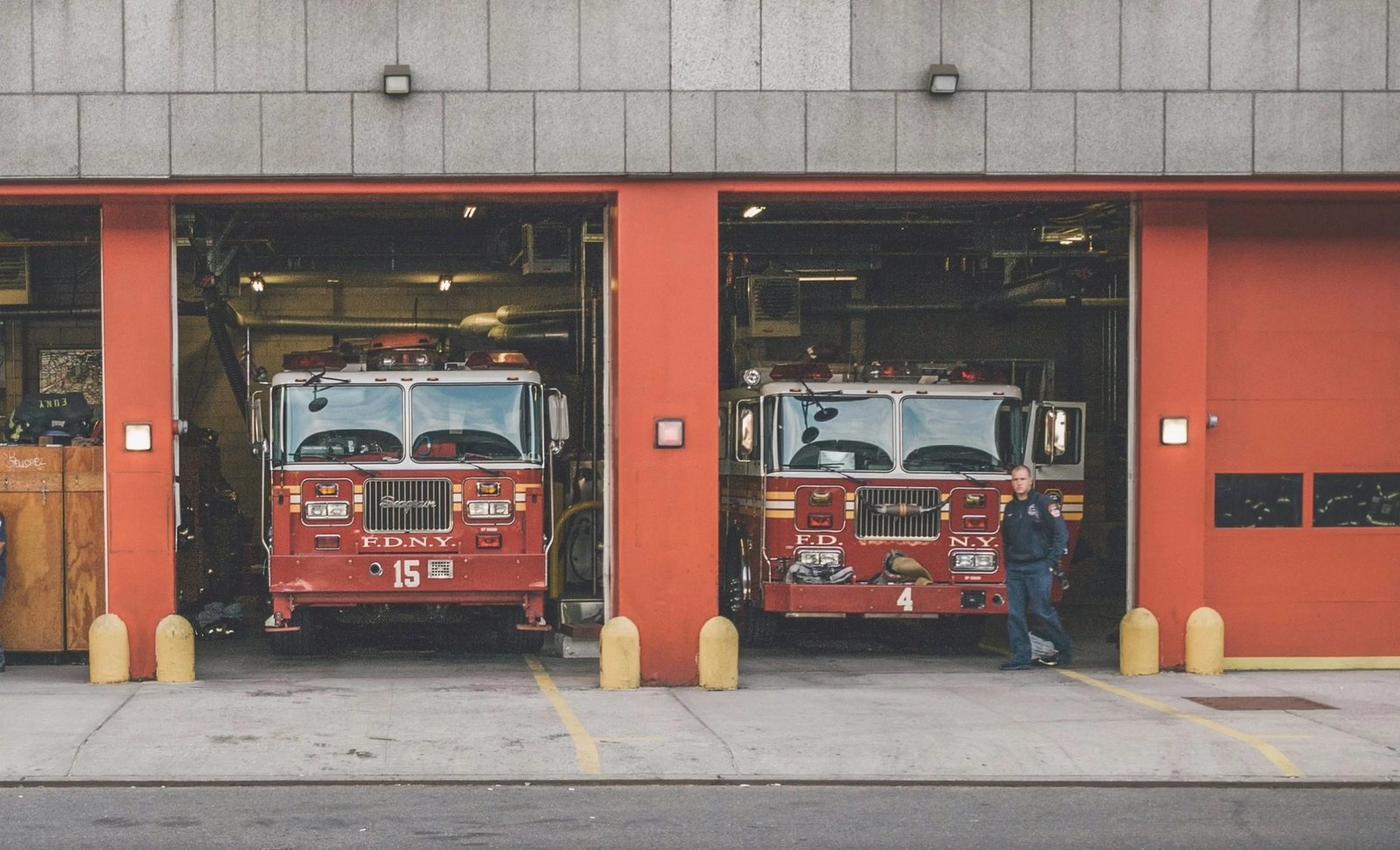 Fire trucks in a fire station bay